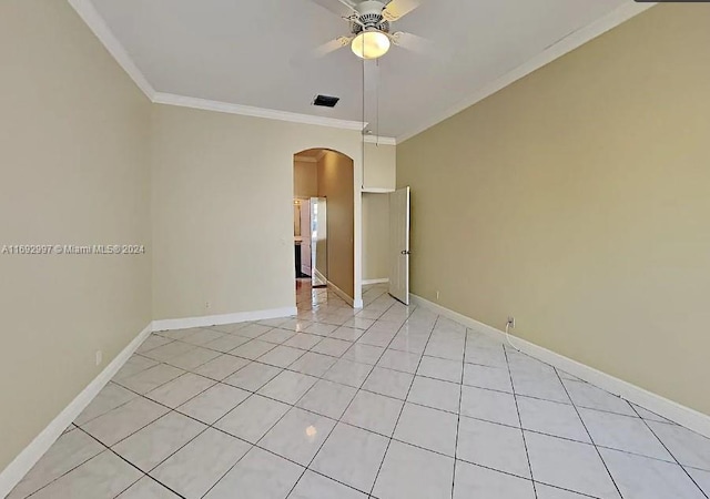 unfurnished room featuring crown molding, ceiling fan, and light tile patterned floors