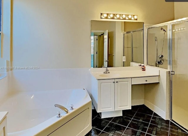 bathroom with plus walk in shower and vanity