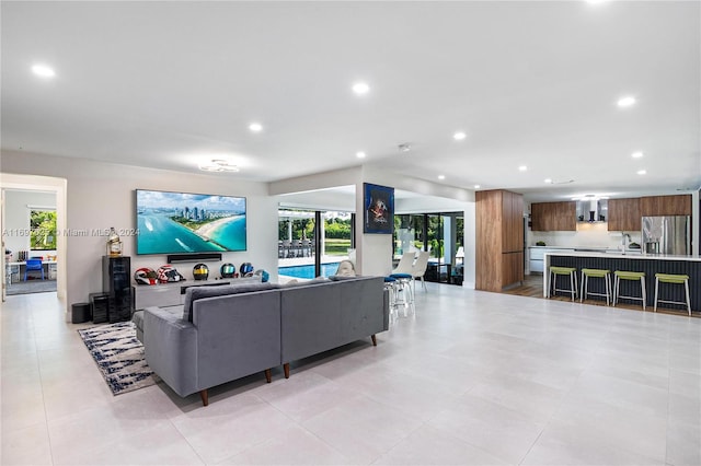 living room with light tile patterned floors