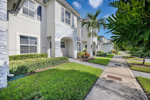 view of property with a front yard