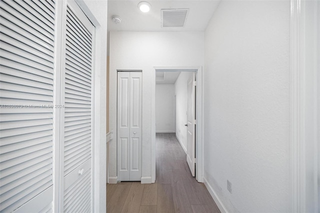 hallway featuring light hardwood / wood-style floors