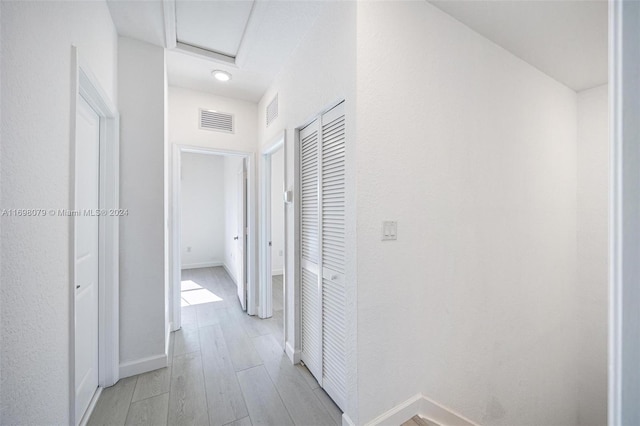 hallway featuring light wood-type flooring