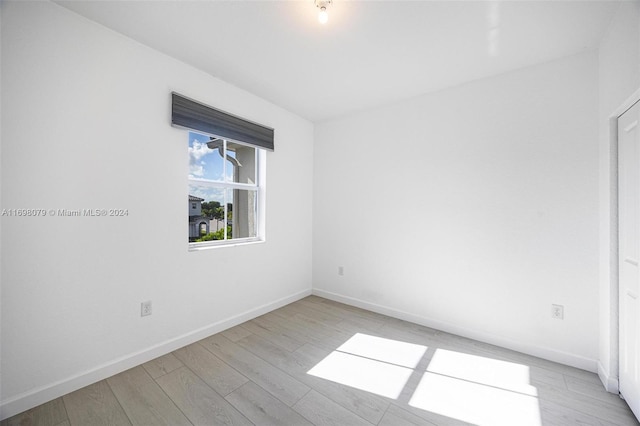 empty room featuring light hardwood / wood-style floors