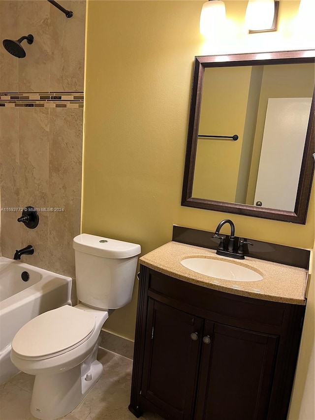 full bathroom featuring vanity, toilet, and tiled shower / bath combo