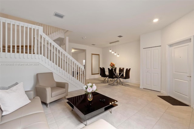 living room with light tile patterned floors