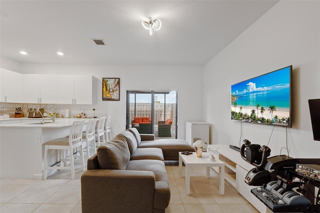 living room featuring light tile patterned floors