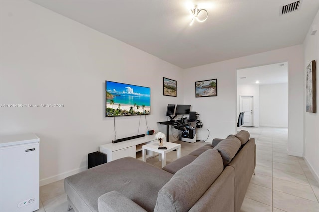 living room with light tile patterned floors