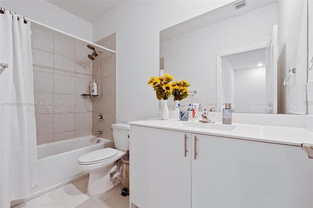 full bathroom with tile patterned flooring, shower / bath combination with curtain, toilet, and vanity