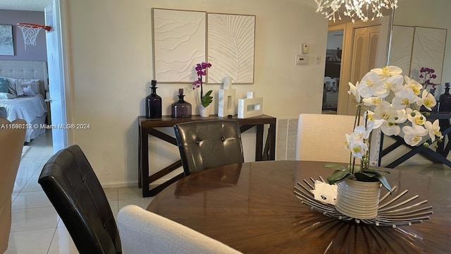 dining space featuring light tile patterned floors