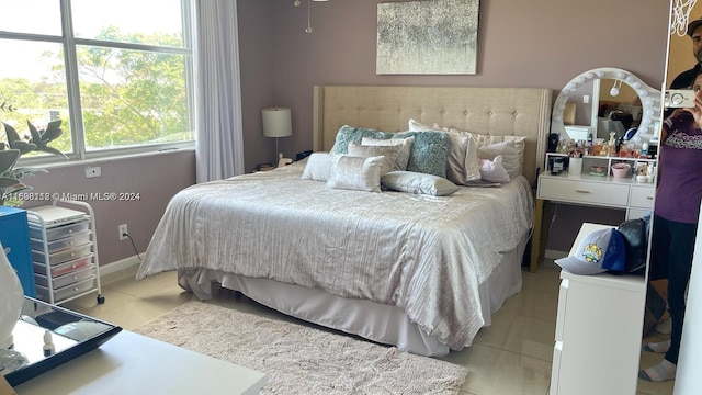 bedroom with tile patterned flooring