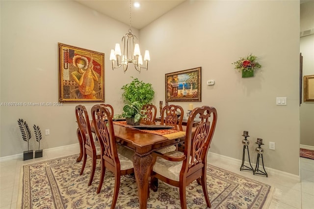 tiled dining area with a notable chandelier