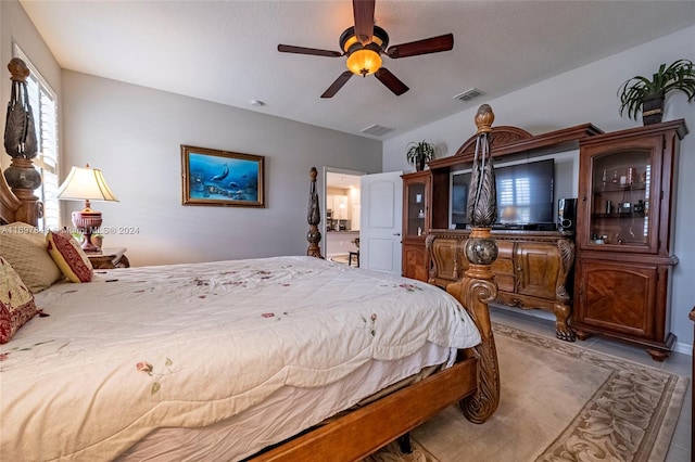 bedroom featuring a textured ceiling and ceiling fan