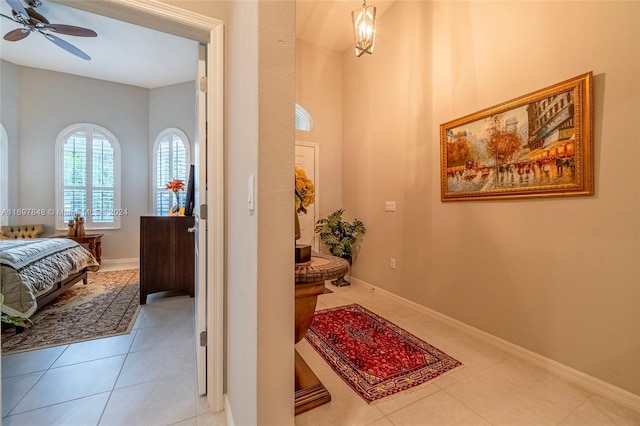 hallway with light tile patterned flooring