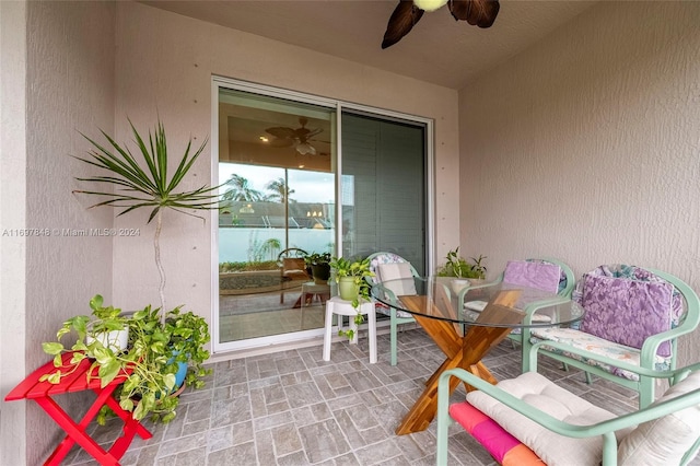 view of patio / terrace featuring ceiling fan