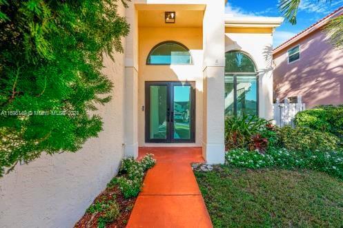 property entrance with french doors