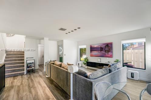 living room with hardwood / wood-style flooring