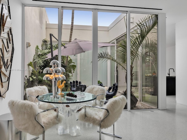 sunroom featuring sink