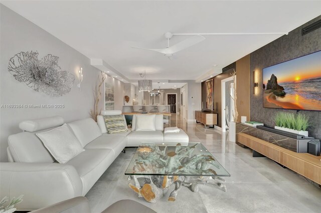 living room featuring an inviting chandelier