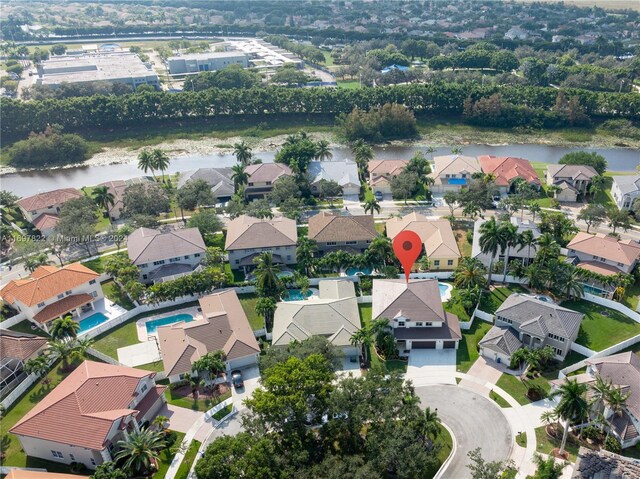 bird's eye view with a water view