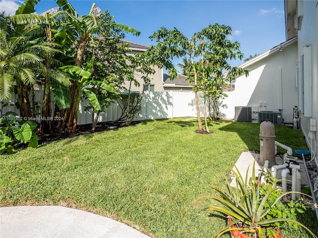 view of yard featuring central AC