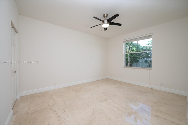 unfurnished room featuring ceiling fan