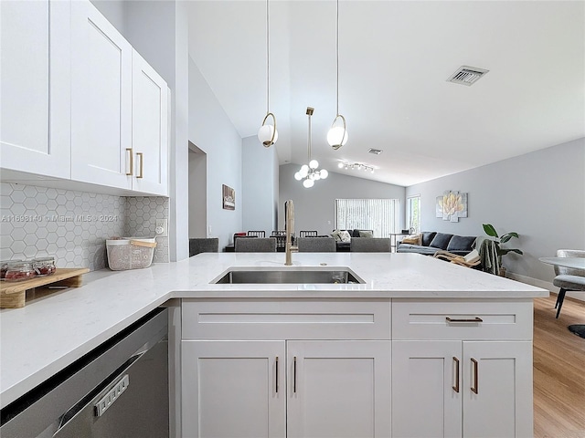 kitchen with sink, white cabinets, and light hardwood / wood-style flooring