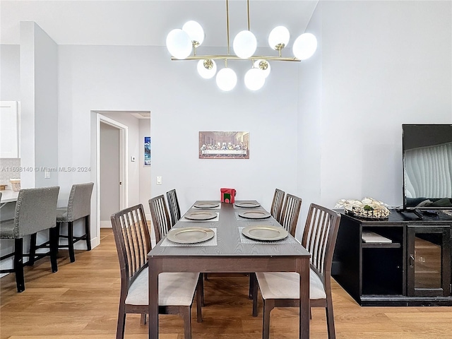 dining area featuring light wood-type flooring