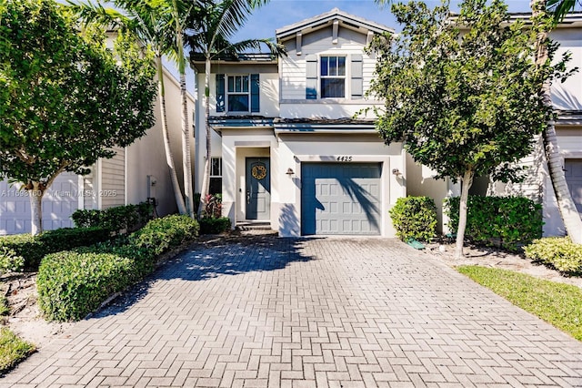 view of front of home with a garage