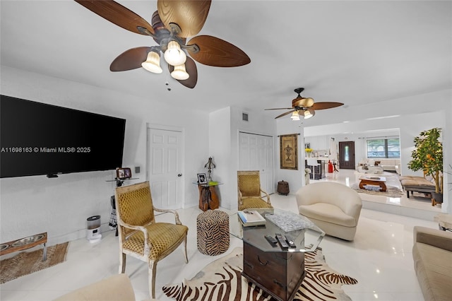 living room with light tile patterned flooring