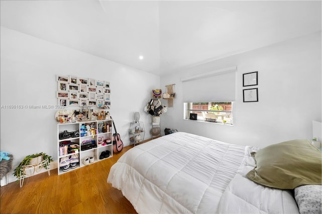1458 Rodman St, Hollywood, FL 33020 - bedroom with wood finished floors, vaulted ceiling, and recessed lighting