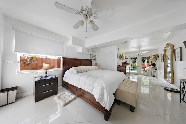 1458 Rodman St, Hollywood, FL 33020 - bedroom with french doors, tile patterned flooring, ceiling fan, and baseboards