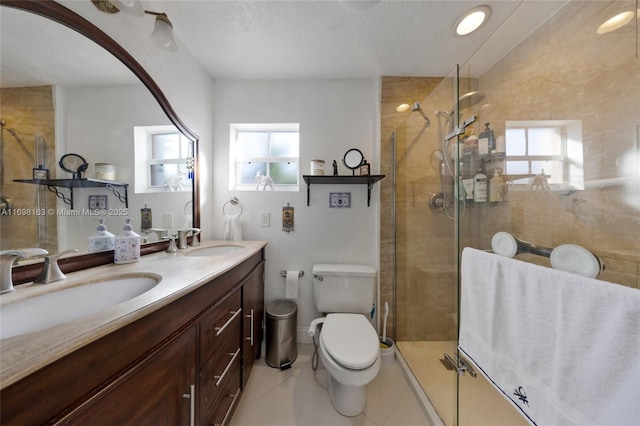 1458 Rodman St, Hollywood, FL 33020 - bathroom with double vanity, toilet, and a stall shower
