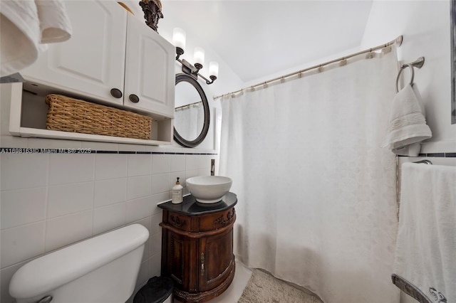 1458 Rodman St, Hollywood, FL 33020 - full bath with vanity, backsplash, toilet, and tile walls
