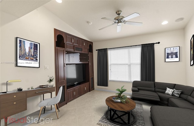 tiled living room featuring ceiling fan and lofted ceiling