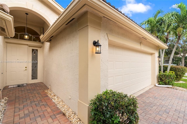 property entrance featuring a garage