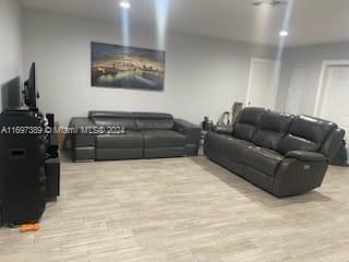 living room featuring light hardwood / wood-style floors