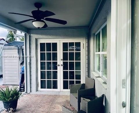 exterior space with ceiling fan, french doors, and a patio