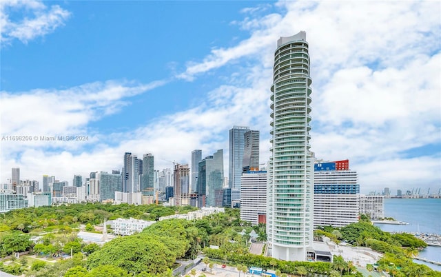 property's view of city with a water view