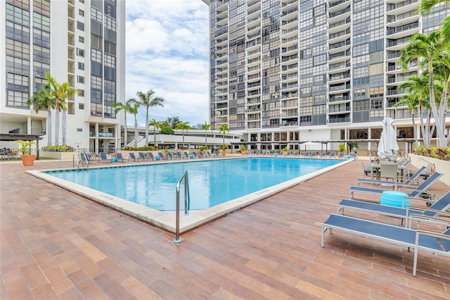 view of pool featuring a patio