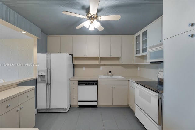 kitchen with ceiling fan, sink, white cabinets, and white appliances