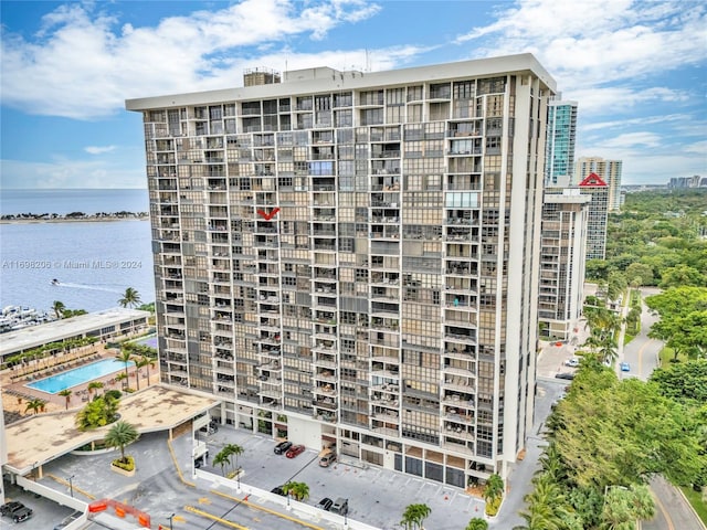 view of building exterior with a water view