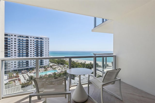 2201 Collins Ave Unit 1015, Miami Beach, FL 33139 - balcony with a water view and view of pool area