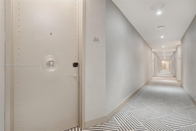 2201 Collins Ave Unit 1015, Miami Beach, FL 33139 - hallway featuring carpet, baseboards, and recessed lighting