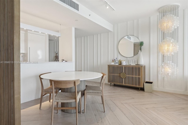 2201 Collins Ave Unit 1015, Miami Beach, FL 33139 - dining area with track lighting