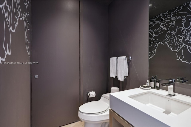 2201 Collins Ave Unit 1015, Miami Beach, FL 33139 - half bath featuring toilet and vanity