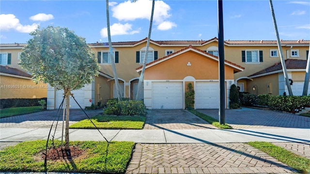 view of front of property with a garage