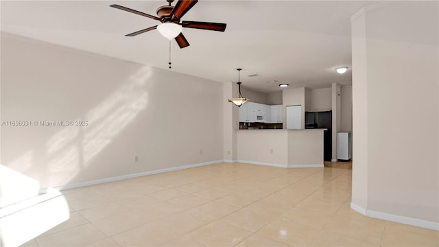 unfurnished living room with light tile patterned floors and ceiling fan