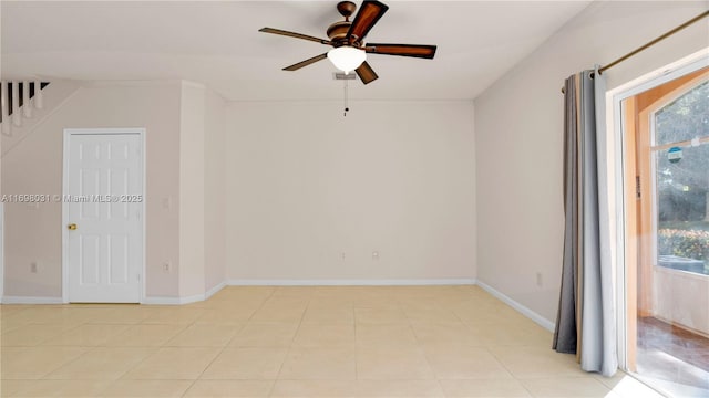 empty room featuring ceiling fan