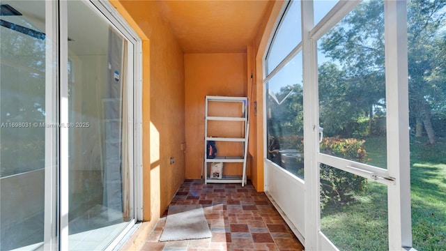 view of unfurnished sunroom