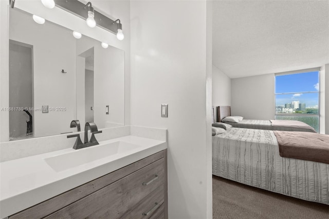 bathroom featuring connected bathroom and vanity